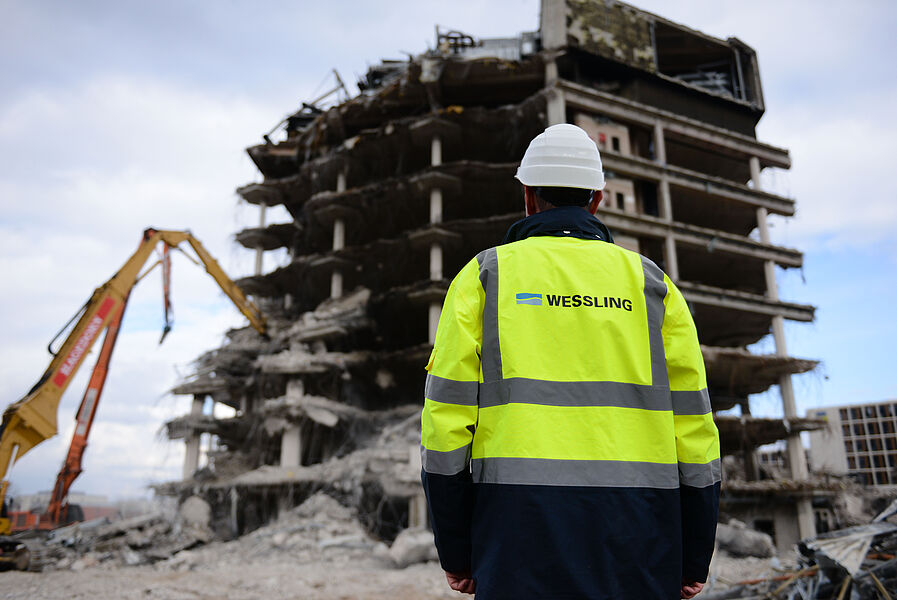 WESSLING employee observes the demolition of the building